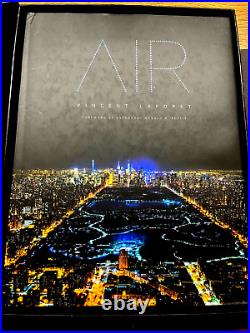 A Box set of Hardcover Air by Vincent Laforet & original photo